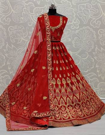 Garb This Wedding Partywear Heavy Designer Lehenga Choli And Dupatta In Fine Color Fabricated On Velvet Beautified With Heavy Attractive Designer Embroidery And Zarkan Diamond Work. 