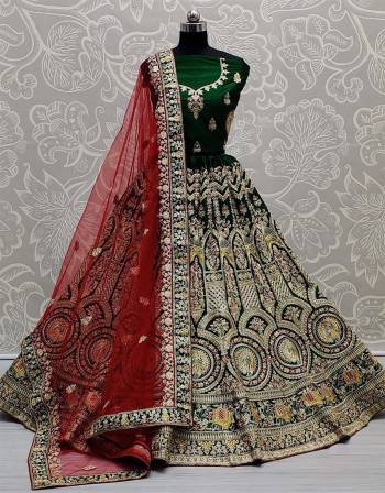 Look Attrective This Wedding Partywear Heavy Designer Lehenga Choli And Dupatta In Fine Color Fabricated On Silk Beautified With Heavy Attractive Embroidery And Zarkan Stone Work. 