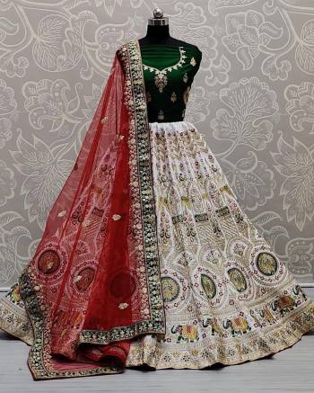 Look Attrective This Wedding Partywear Heavy Designer Lehenga Choli And Dupatta In Fine Color Fabricated On Silk Beautified With Heavy Attractive Embroidery And Zarkan Stone Work. 