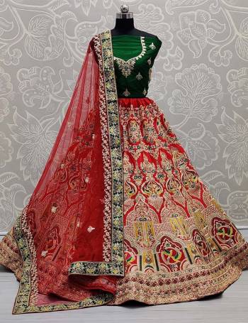 Look Attrective This Wedding Partywear Heavy Designer Lehenga Choli And Dupatta In Fine Color Fabricated On Silk Beautified With Heavy Attractive Embroidery And Zarkan Stone Work. 