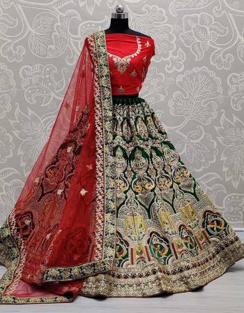 Look Attrective This Wedding Partywear Heavy Designer Lehenga Choli And Dupatta In Fine Color Fabricated On Silk Beautified With Heavy Attractive Embroidery And Zarkan Stone Work. 