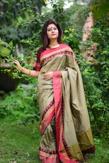 Stylist Looking This Fastival Saree Are Fine Saree Paired With Blouse.This Saree And Blouse Are Fancy Raw Silk Based Fabric With Designer Wevon Cheks And Temple Work. Buy This Pretty Saree Now.