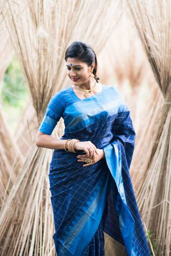 Stylist Looking This Fastival Saree Are Fine Saree Paired With Blouse.This Saree And Blouse Are Fancy Raw Silk Based Fabric With Designer Wevon Cheks And Temple Work. Buy This Pretty Saree Now.