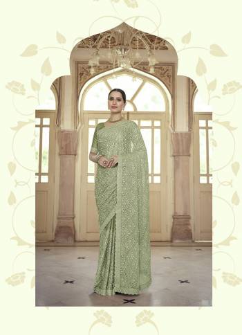 Stylist This Partywear Saree Are Fine Saree Paired With Blouse.This Saree And Blouse Are Fancy Based Fabric With Fancy Designer Embroidery Work. Buy This Pretty Saree Now.