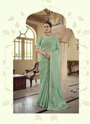 Stylist This Partywear Saree Are Fine Saree Paired With Blouse.This Saree And Blouse Are Fancy Based Fabric With Fancy Designer Embroidery Work. Buy This Pretty Saree Now.