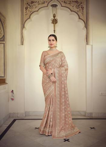 Stylist This Partywear Saree Are Fine Saree Paired With Blouse.This Saree And Blouse Are Fancy Based Fabric With Fancy Designer Embroidery Work. Buy This Pretty Saree Now.