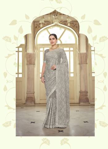 Stylist This Partywear Saree Are Fine Saree Paired With Blouse.This Saree And Blouse Are Fancy Based Fabric With Fancy Designer Embroidery Work. Buy This Pretty Saree Now.