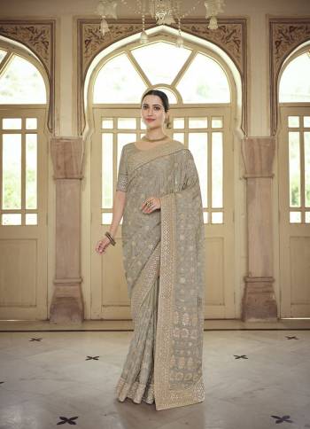 Stylist This Partywear Saree Are Fine Saree Paired With Blouse.This Saree And Blouse Are Fancy Based Fabric With Fancy Designer Embroidery Work. Buy This Pretty Saree Now.