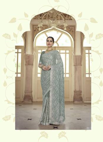 Stylist This Partywear Saree Are Fine Saree Paired With Blouse.This Saree And Blouse Are Fancy Based Fabric With Fancy Designer Embroidery Work. Buy This Pretty Saree Now.