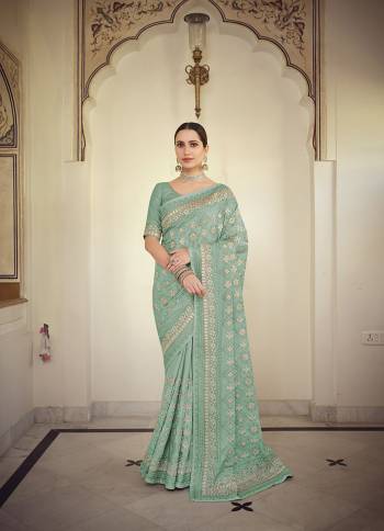 Stylist This Partywear Saree Are Fine Saree Paired With Blouse.This Saree And Blouse Are Fancy Based Fabric With Fancy Designer Embroidery Work. Buy This Pretty Saree Now.