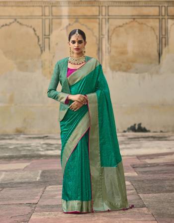 Garb This Stylist Partywear Saree Are Fine Saree Paired With Blouse.This Saree Silk And Blouse Are Jacquard Silk Fabric With Heavy Designer Jacquard Work. Buy This Pretty Saree Now.