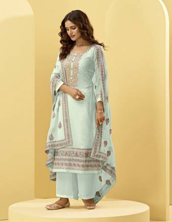 Attrective This Designer Long Length Suit In Lovely Light Color.Its Pretty Heavy Designer Thread,Jari Cording Embroidery And Swaroski Hand Work Top Is Georgette Based Paired With Dull Santoon Bottom And Georgette Fabricated Dupatta Which Gives An Attractive To The Suit.