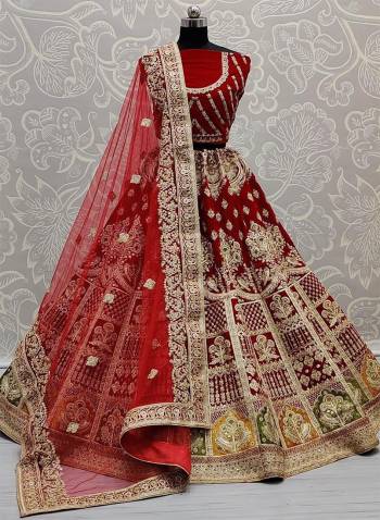 Stylist This Wedding Partywear Heavy Designer Lehenga Choli And Dupatta In Fine Color Fabricated On Velvet Beautified With Heavy Attractive Designer Embroidery And Zarkan Diamond Work. 