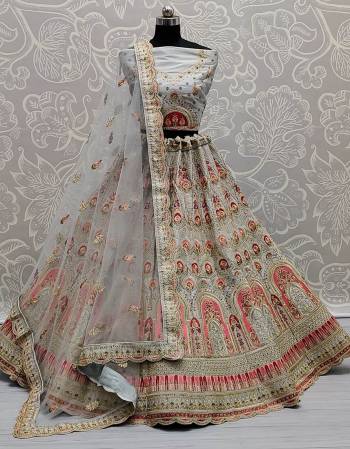 Stylist This Wedding Partywear Heavy Designer Lehenga Choli And Dupatta In Fine Color Fabricated On Silk Beautified With Heavy Attractive Designer Embroidery And Zarkan Diamond With Daul Patch Work. 