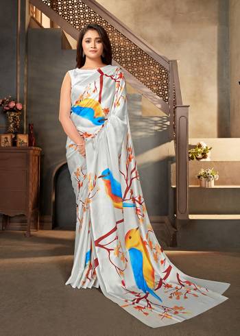 This Attrective Partywear Saree Are Fine Saree Paired With Blouse.This Saree And Blouse Are Satin Crepe Based Fabric With Designer Digital Printed. Buy This Pretty Saree Now.