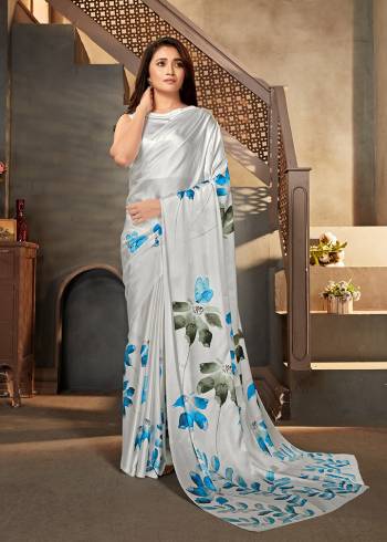 This Attrective Partywear Saree Are Fine Saree Paired With Blouse.This Saree And Blouse Are Satin Crepe Based Fabric With Designer Digital Printed. Buy This Pretty Saree Now.