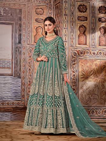 Stylist This Partywear Designer Long Length Suit In Lovely Color.Its Pretty Heavy Designer Embroidery Work Top Is Net Based Paired With Santoon Bottom And Net Fabricated Dupatta Which Gives An Attractive To The Suit.