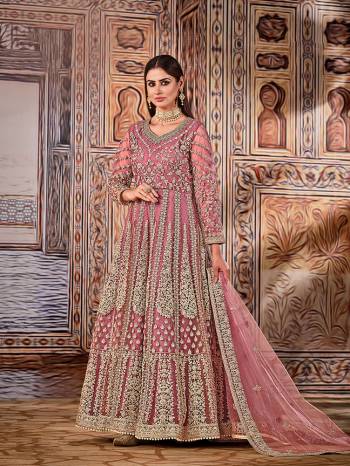 Stylist This Partywear Designer Long Length Suit In Lovely Color.Its Pretty Heavy Designer Embroidery Work Top Is Net Based Paired With Santoon Bottom And Net Fabricated Dupatta Which Gives An Attractive To The Suit.