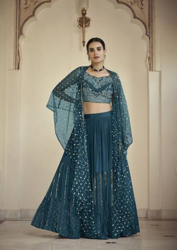 Garb This Partywear Readymade Designer Lehenga Choli And Jacket In Fine Color Fabricated On Geoegette Beautified Fabric With Heavy Designer Sequance And Thread Embroidery Work. 