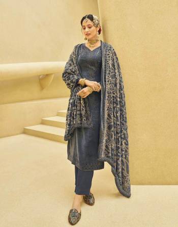 Fine Looking This Designer Long Length Suit In Lovely Color.Its Pretty Designer Embroidery And Hand Work Top Is Velvet Based Paired With Pashmina Bottom And Velvet With Fabricated Dupatta Which Gives An Attractive To The Suit.