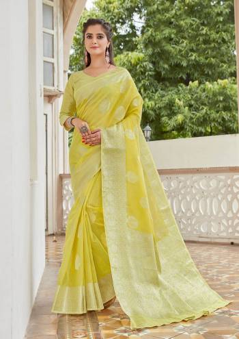 Garb This Festival Saree Are Fine Saree Paired With Blouse.This Saree And Blouse Are Linen Based Fabric With Heavy Designer Weaving Work. Buy This Pretty Saree Now.