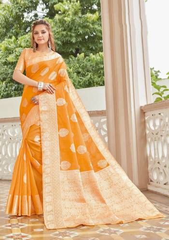 Garb This Festival Saree Are Fine Saree Paired With Blouse.This Saree And Blouse Are Linen Based Fabric With Heavy Designer Weaving Work. Buy This Pretty Saree Now.