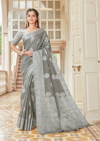 Garb This Festival Saree Are Fine Saree Paired With Blouse.This Saree And Blouse Are Linen Based Fabric With Heavy Designer Weaving Work. Buy This Pretty Saree Now.