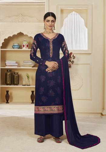 Garb This Long Length Suit Pretty Heavy Designer Embroidery With Hand Work With Inner Are Digital Printed Top Is Georgette Based Paired With Santoon Bottom And Nazneen Fabricated Dupatta Which Gives An Attractive To The Suit.