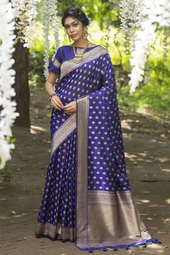 Stylist This Fastival Saree Are Fine Saree Paired With Blouse.This Saree And Blouse Are Banarasi Cotton Silk Based Fabric With Heavy Wevon Jari Designer Work.Buy This Pretty Saree Now.