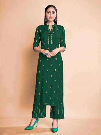 Attrective This Readymade Long Dress In Fine Color Top And Bottom Are Rayon Fabricated Beautified With Designer Foil Printed. It Is Light In Weight And Easy To Carry All Day Long. 