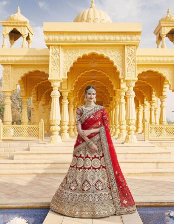 Attrective This Wedding Partywear Designer Lehenga Choli And Dupatta In Red Color Fabricated On Velvet Beautified Fabric With Heavy Designer Embroidery With Hand Work. Buy Now.