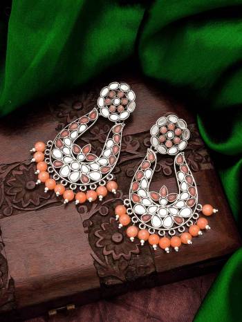 Attrective Look To Your Personality By Pairing Up This Beautiful Earring With Your Ethnic Attire. This Pretty Set Is In Fine Color Beautified With Kundan Work. Buy Now.