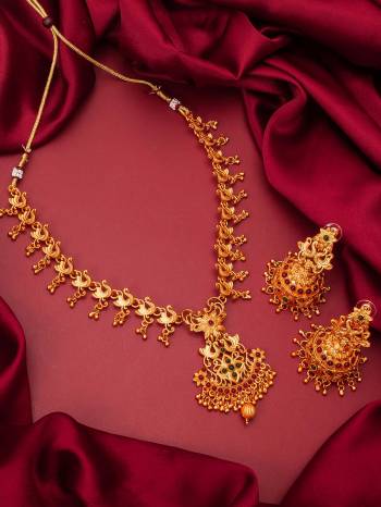 Heavy Looking To Your Personality By Pairing Up This Beautiful Necklace Set With Your Ethnic Attire. This Prtty Set Is In Gold Color Beautified With Temple Work. Buy Now.