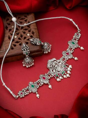 Heavy Looking To Your Personality By Pairing Up This Beautiful Necklace Set With Your Ethnic Attire. This Prtty Set Is In Silver Color Beautified With Temple Work. Buy Now.