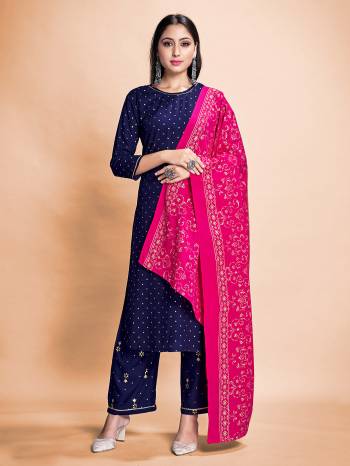 Garb This Readymade Long Dress In Fine Color Top And Bottom With Dupatta Are Rayon Fabricated Beautified With Designer Foil Printed. It Is Light In Weight And Easy To Carry All Day Long. 