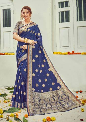 Garb This Designer Partywear Saree Are Fine Saree Paired With Blouse.This Saree And Blouse Are Cotton Based Fabric With Wevon Designer Work. Buy This Pretty Saree Now.