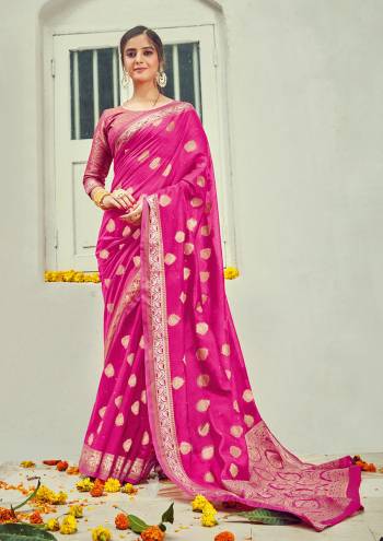 Garb This Designer Partywear Saree Are Fine Saree Paired With Blouse.This Saree And Blouse Are Cotton Based Fabric With Wevon Designer Work. Buy This Pretty Saree Now.