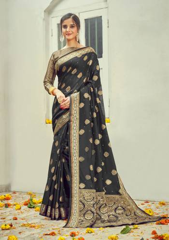 Garb This Designer Partywear Saree Are Fine Saree Paired With Blouse.This Saree And Blouse Are Cotton Based Fabric With Wevon Designer Work. Buy This Pretty Saree Now.