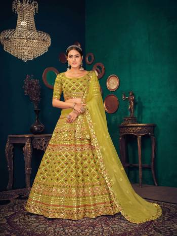 Attrective This Wedding Partywear Heavy Designer Lahenga Choli In Georgette And Dupatta Net In Fabricated Beautified With Attrective Multy Thread, Gota Patti Embroidery With Diamond Work.Buy Now. 