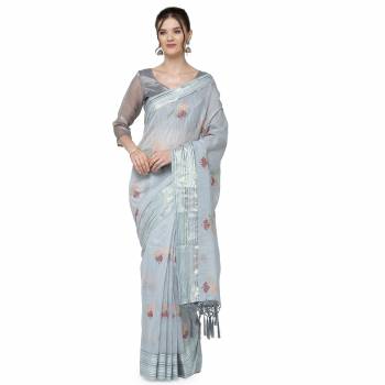 Garb This Partywear Saree Are Light Saree Paired With Blouse.This Saree And Blouse Are Cotton Based Fabric With Designer Wevon Border With Embroidery Work. Buy This Pretty Saree Now.