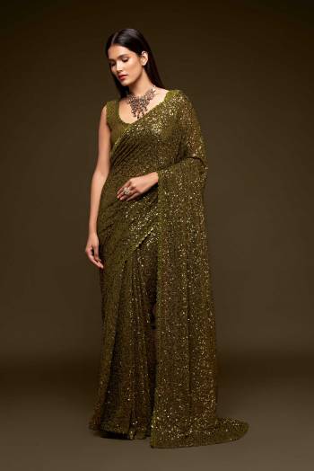 Partywear This Pretty Elegant Looking Designer Saree In Fine Color Paired With Blouse. This Saree And Blouse Are Georgette Based Beautified With Heavy Designer Sequance Embroidery Work With Blouse Work. Buy Now.