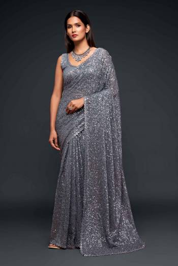 Partywear This Pretty Elegant Looking Designer Saree In Fine Color Paired With Blouse. This Saree And Blouse Are Georgette Based Beautified With Heavy Designer Sequance Embroidery Work With Blouse Work. Buy Now.