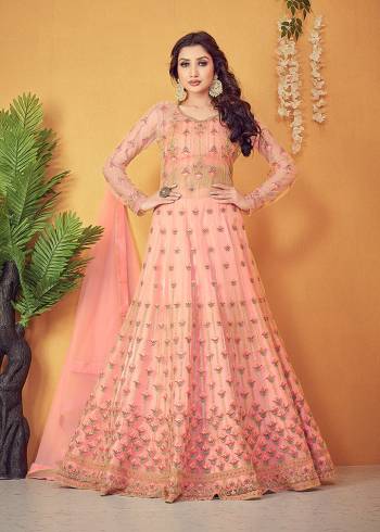 Flaunt Your Rich And Elegant Taste Wearing This Designer Long Gown With Dupatta In Light Color. This  Pretty Gown And Dupatta Is Fabricated On Super Net Beautified With Heavy Thread Embroidery With Diamond Work. Its Fabric Is Soft Towards Skin And Easy To Carry All Day Long. 