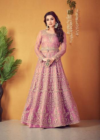 Flaunt Your Rich And Elegant Taste Wearing This Designer Long Gown With Dupatta In Light Color. This  Pretty Gown And Dupatta Is Fabricated On Super Net Beautified With Heavy Thread Embroidery With Diamond Work. Its Fabric Is Soft Towards Skin And Easy To Carry All Day Long. 