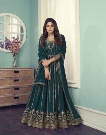 Attrective This Designer Long Length Suit In Lovely Color.Its Pretty Heavy Designer Sequance Embroidery Work Top Is Georgette Based Paired With Santoon Bottom And Georgette Fabricated Dupatta Which Gives An Attractive To The Suit.