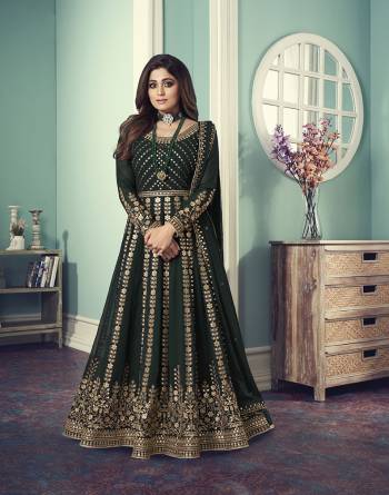 Attrective This Designer Long Length Suit In Lovely Color.Its Pretty Heavy Designer Sequance Embroidery Work Top Is Georgette Based Paired With Santoon Bottom And Georgette Fabricated Dupatta Which Gives An Attractive To The Suit.