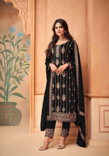 Garb This Designer Long Suit In Lovely Color.Its Pretty Heavy Designer Embroidery Work Top Is Faux Georgette Based Paired With Santoon Bottom And Faux Georgette Fabricated Dupatta Which Gives An Attractive To The Suit.