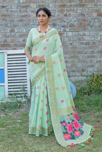 Classic Designer Partywear Saree Are Fine Saree Paired With Blouse.This Saree And Blouse Are Linen Based Fabric With Heavy Wevon Meenakari Colourful Tassels Designer. Buy This Pretty Saree Now.