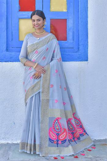 Stylist This Designer Partywear Saree Are Fine Saree Paired With Blouse.This Saree And Blouse Are Linen Based Fabric With Heavy Wevon Meenakari Colourful Tassels Designer. Buy This Pretty Saree Now.