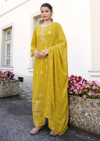 Stylist This Designer Long Length Suit In Lovely Light Color.Its Pretty Designer Embroidery Work Top Is Georgette Based Paired With Dull Sentoon Bottom And Georgette Fabricated Dupatta Which Gives An Attractive To The Suit.